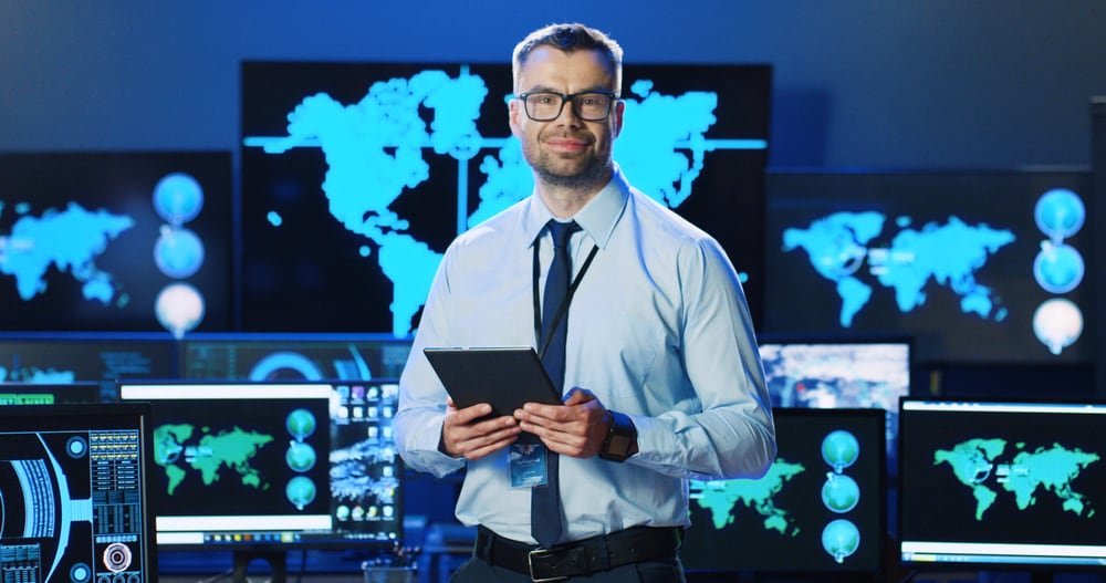 Portrait,Of,Handsome,Caucasian,Man,In,Glasses,And,Tie,,Standing Managed Service Provider (MSSP)